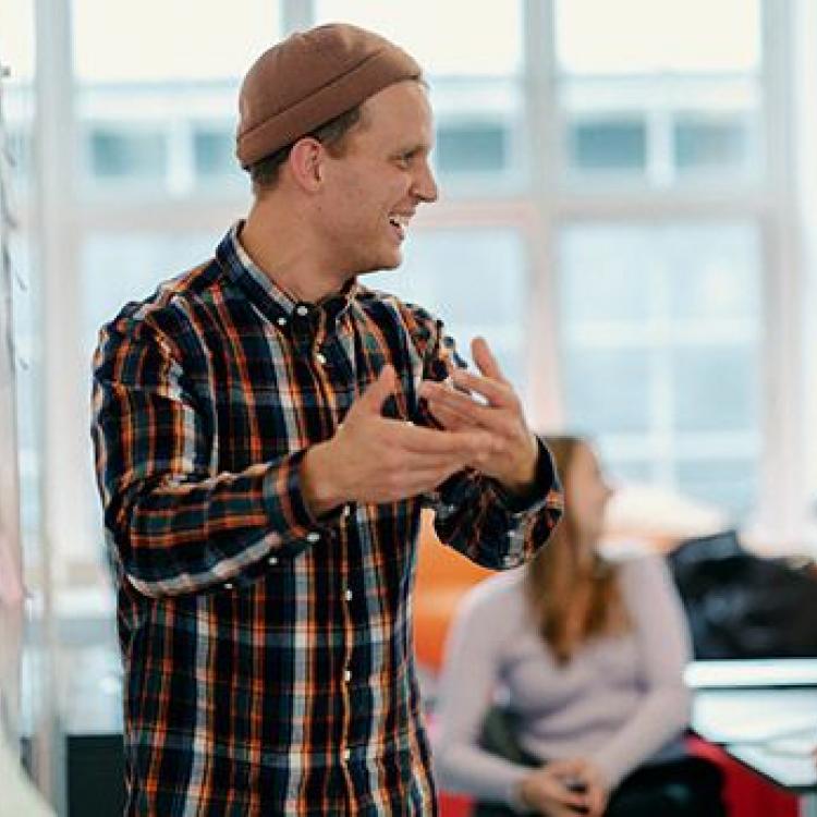 Teacher giving a form of presentation