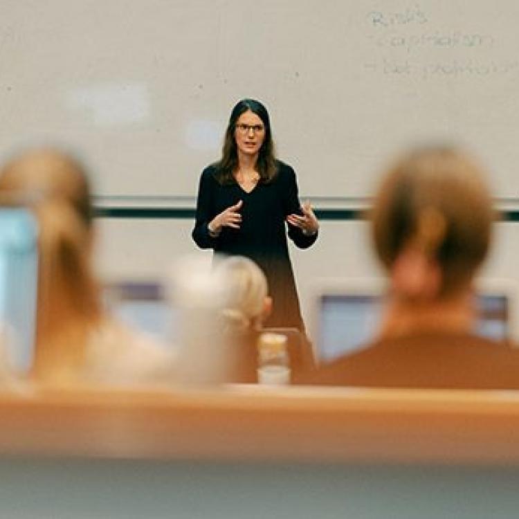 Teacher giving a form of presentation