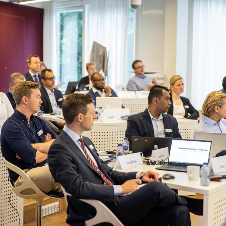 Blue MBA Participants in class