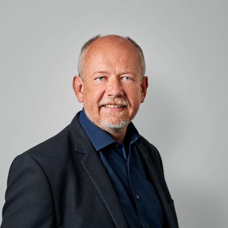 Portæt af Palle Høy taler ved eventet Open Innovation af Executive Education