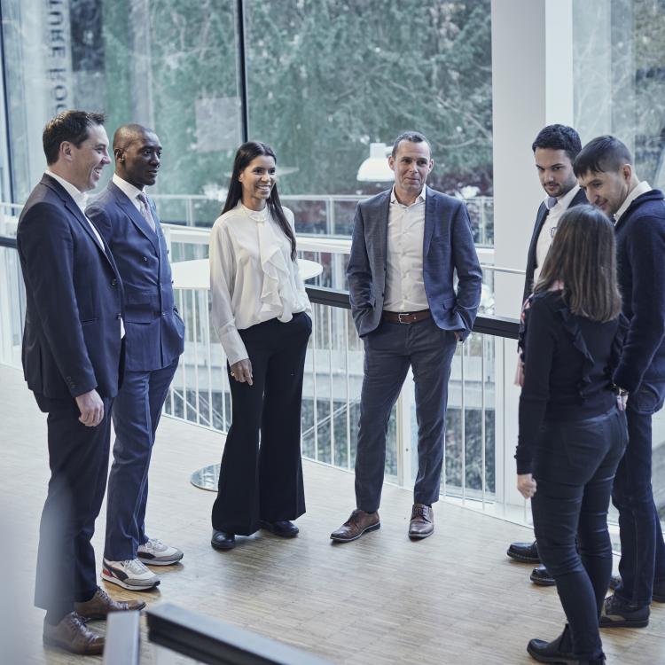 Image of several Blue MBA participants networking