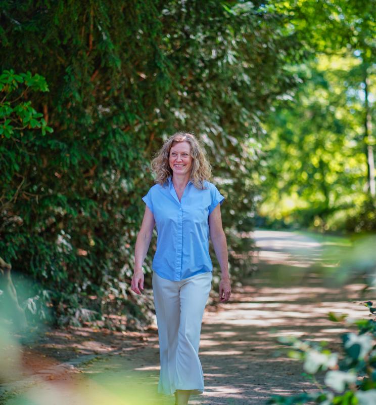 Portrait of Charlotte Rojgaard walking in the park