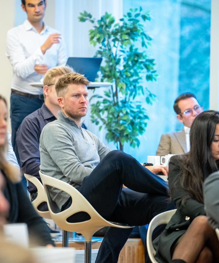 Executive MBA students engaged in classroom learning