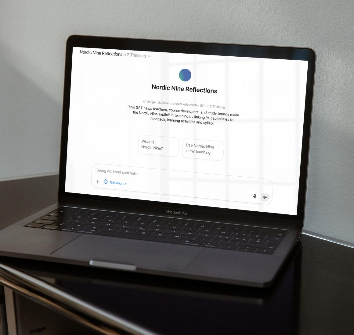 Laptop with Nordic Nine bot in browser