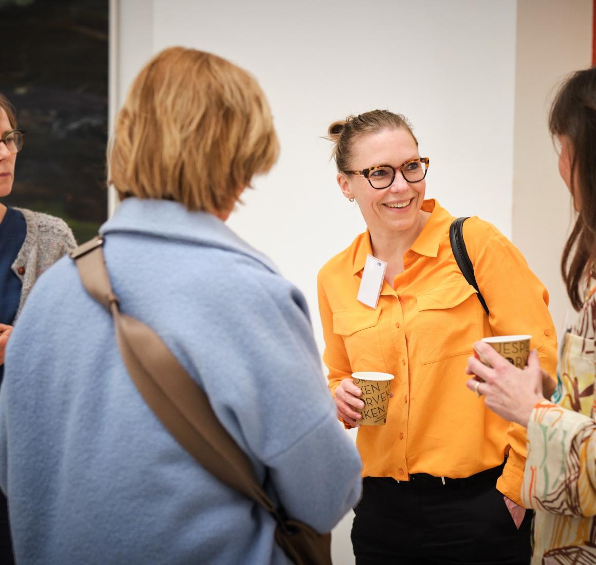Participants networking during CBS Executive Education event. 