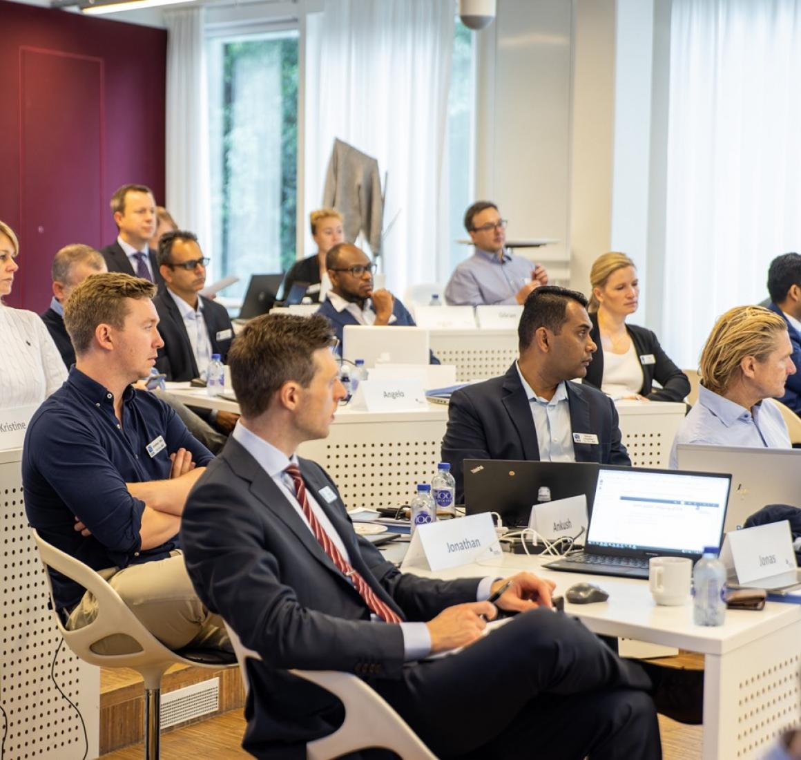 Blue MBA Participants in class
