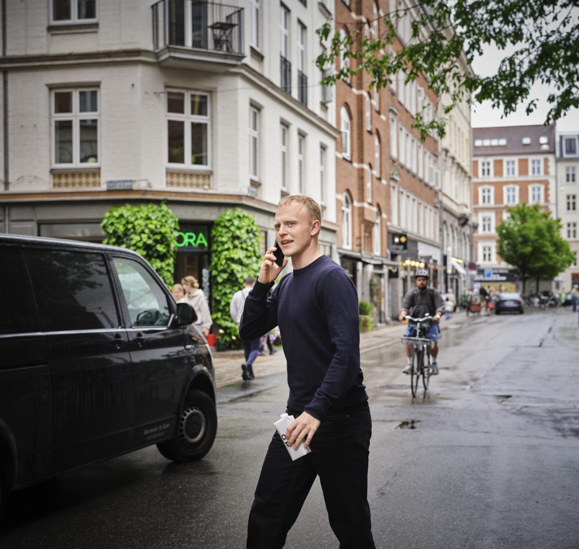 EMBA alumni Emil Schandorff is talking on his phone