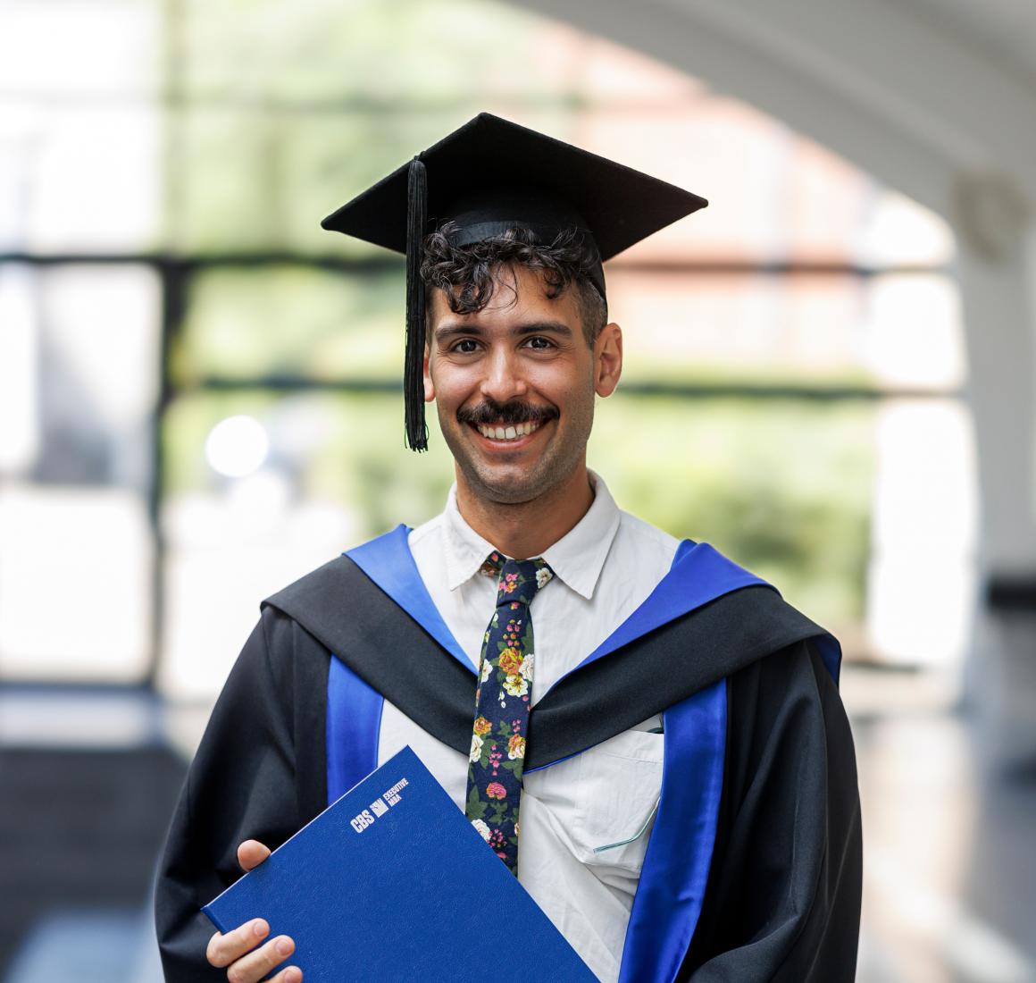 Portrait of Daniel Tewfik at his EMBA graduation