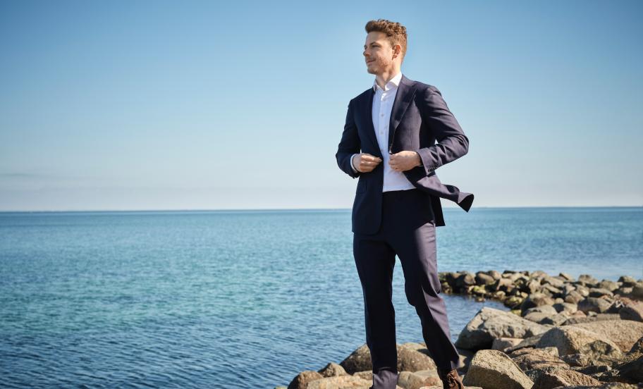 Portrait of Lucas Martiny Schmølker, standing by waterfront