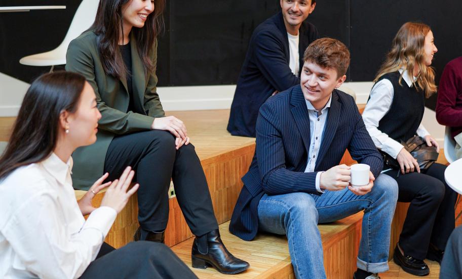 MBA participants networking after class.