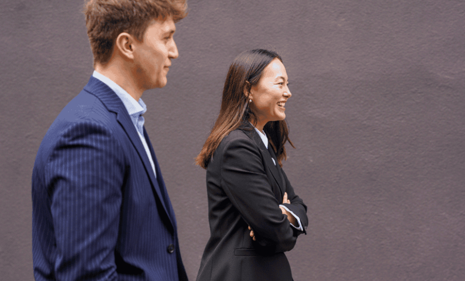 Two MBA students walking together