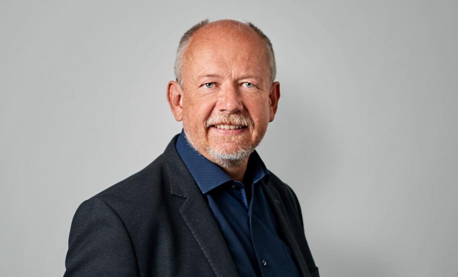 Portæt af Palle Høy taler ved eventet Open Innovation af Executive Education