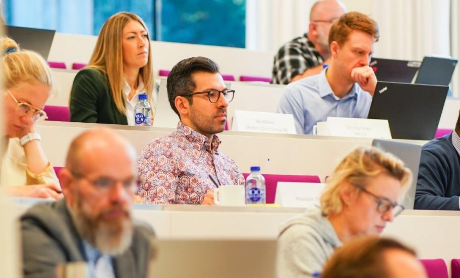 Participants at EMBA in auditorium 