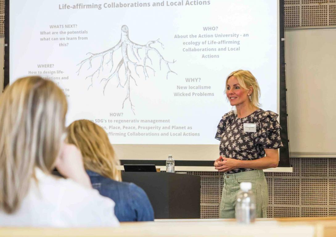 Christa Breum Amhøj speaking at Executive Education event, To reduce or to restore